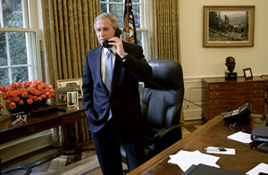 President George W. Bush on the phone