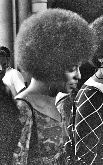 Angela Davis walking into lecture hall