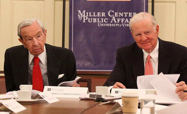 Warren Christopher and James Baker at a table