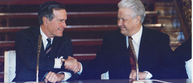 George Bush and Boris Yeltsin shaking hands