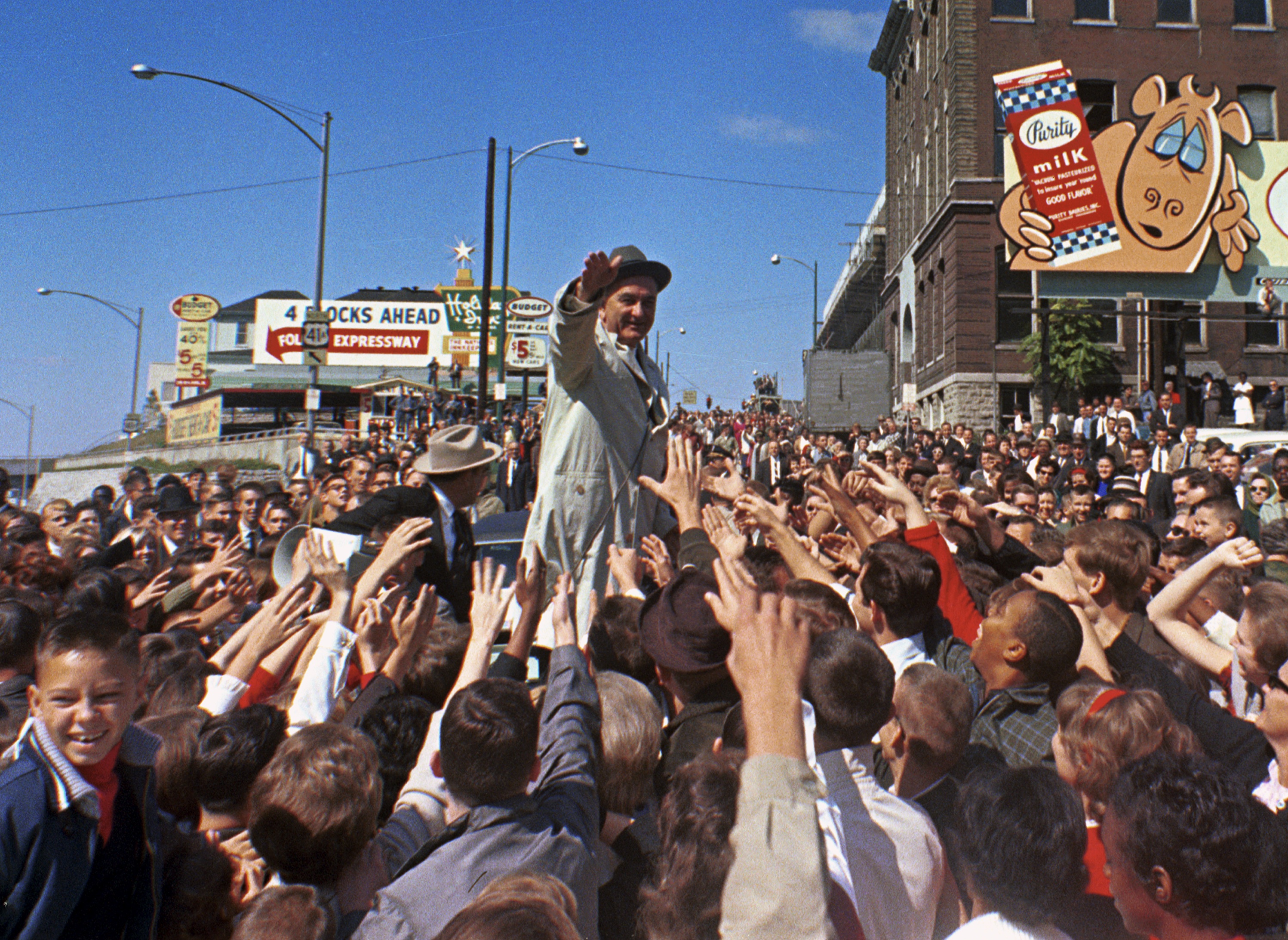 President Lyndon B. Johnson campaigning, waving to crowd in Nashville, Tennessee.
