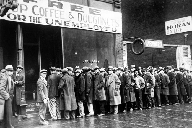 Black and white photo of men in a bread line during the Great Depression