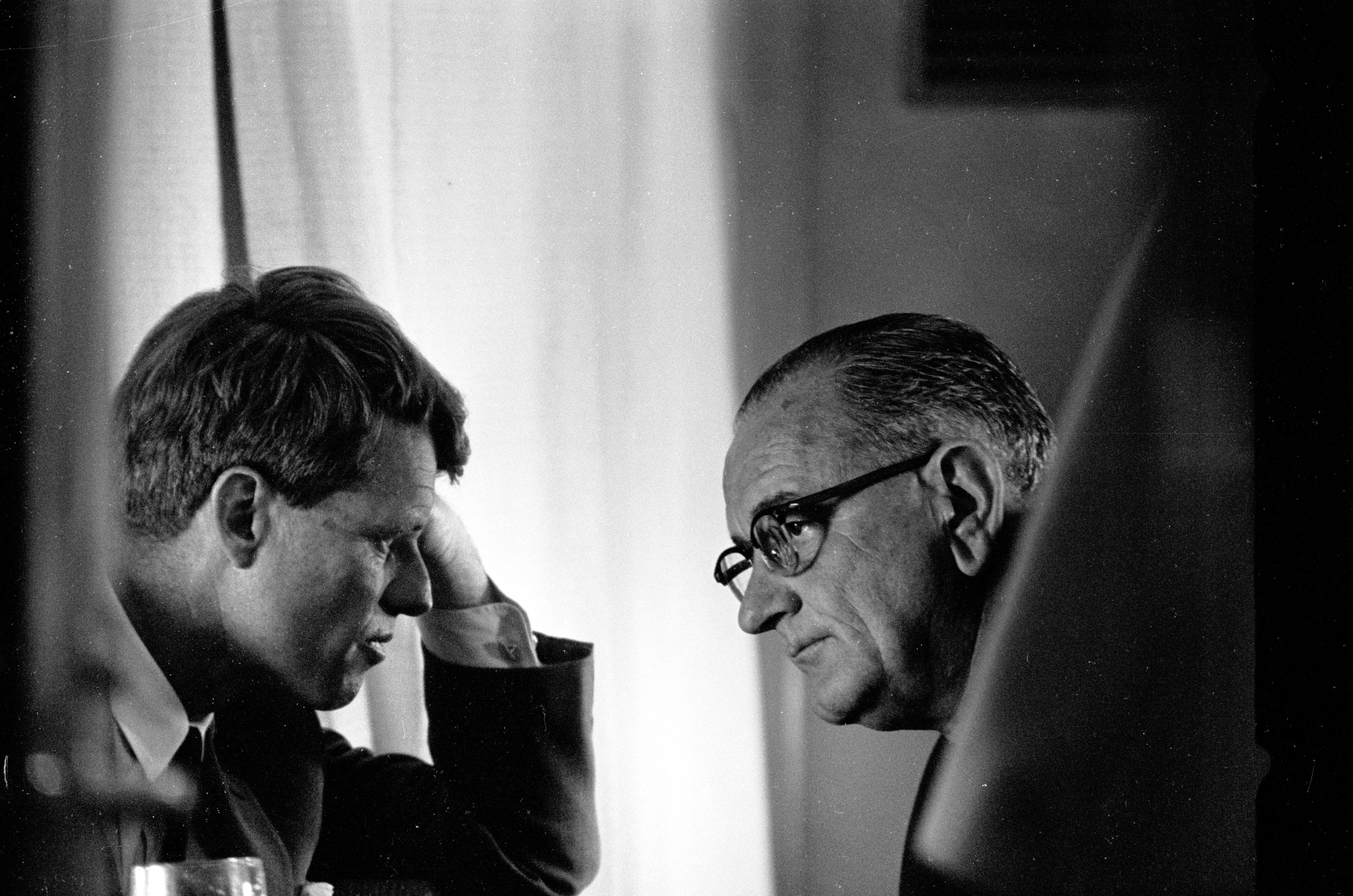Robert F. Kennedy and President Lyndon B. Johnson meeting in the White House in 1964.