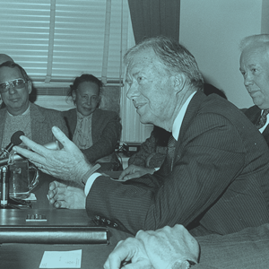Jimmy Carter speaking at table