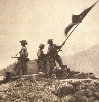 Soldiers raise flag over Dien Bien Phu