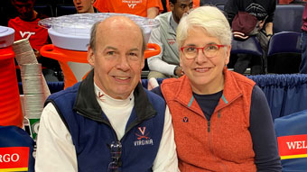 Kip Acheson and Elizabeth Carr at a UVA basketball game