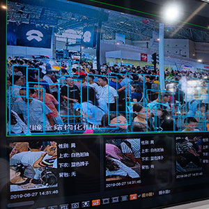 Display of facial recognition aided by AI at Smart China Expo, 2019