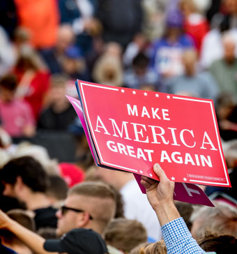 "Make America Great Again" sign held above a crowd