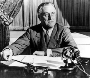 Franklin Roosevelt in front of microphone