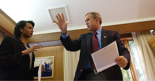 Condoleezza Rice talking with President George W. Bush