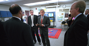 President Bush and advisors consulting following the September 11th attacks. 