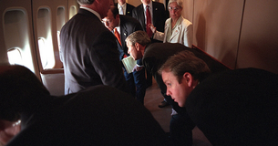 President George W. Bush onboard Air Force One en route to Barksdale Air Base. 
