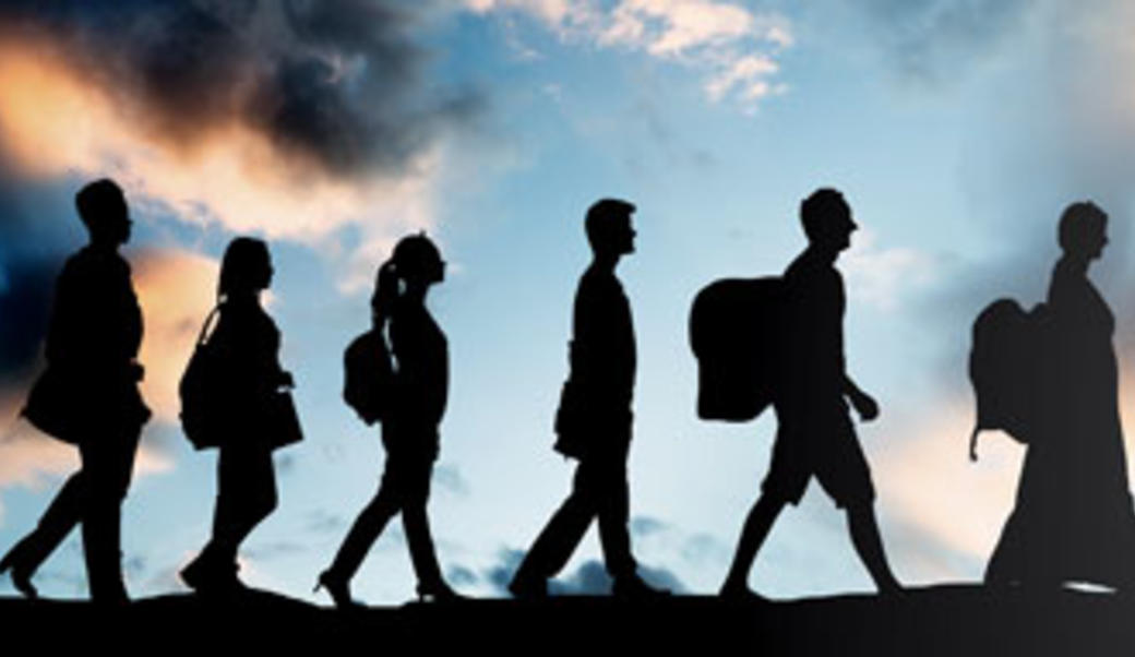 silhouetted travelers