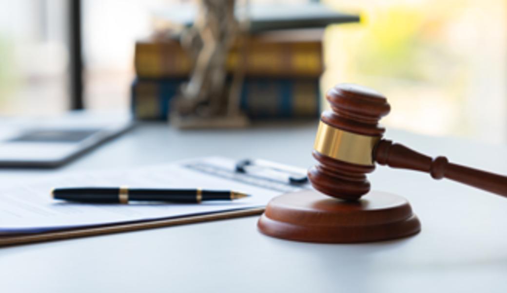gavel and pen on a desk
