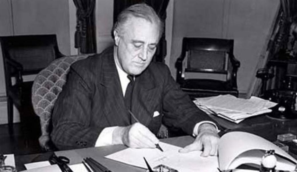 President Roosevelt at a desk