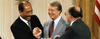 Anwar Sadat, President Carter, and Menachem Begin sign Camp David Accords