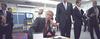 President George W. Bush talks on a secure phone at Emma E. Booker Elementary School in Sarasota, FL, on September 11, 2001.